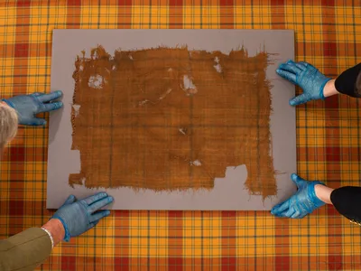 The Glen Affric tartan, which dates to the 16th century, on top of the newly recreated pattern