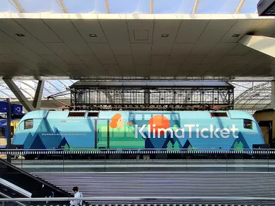 A train in Austria displays an ad for the Klimaticket.